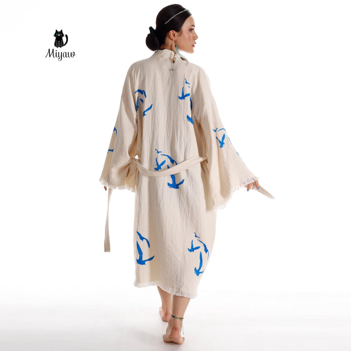 Beige seagull-print kimono robe with blue birds, open back, tied waist belt, fringe sleeves