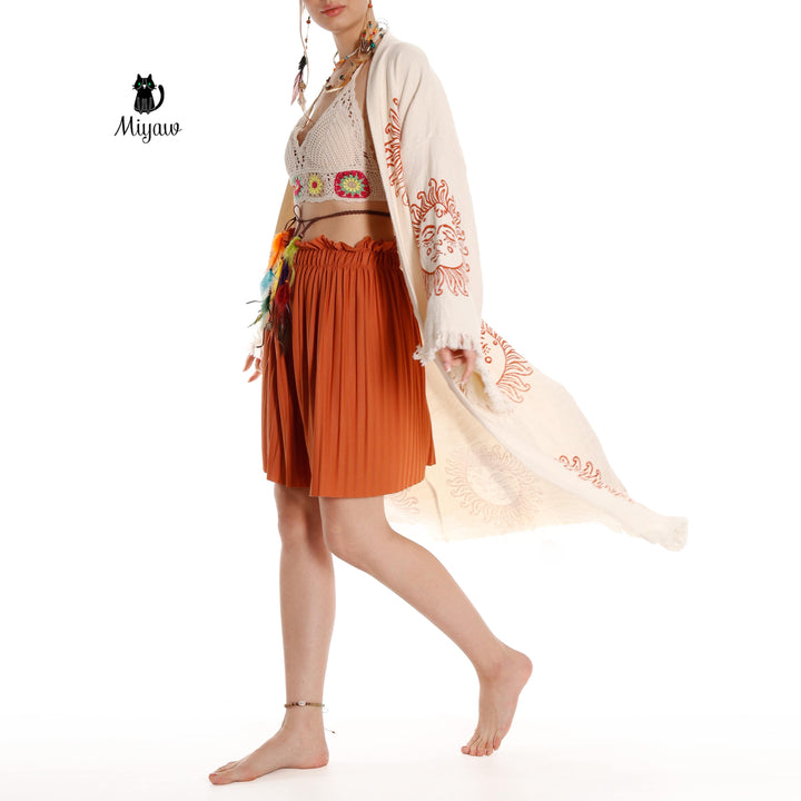 Beige cotton kimono robe with orange sun-face print and long fringed sash-style tie
