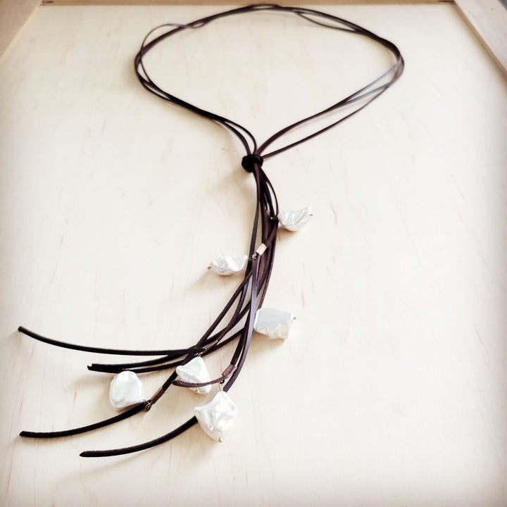 Dark brown cord necklace with knotted loop and white pearl bead fringe