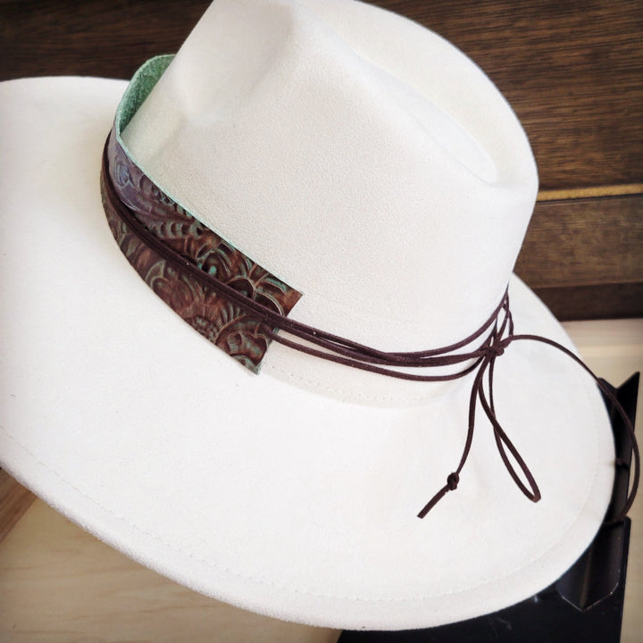 Wide genuine leather hat band end with floral print and dark brown lace ties