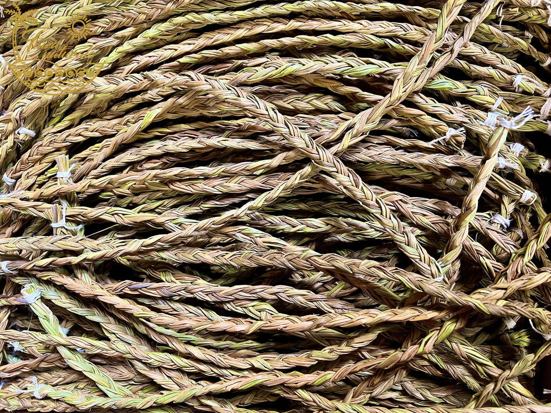 20-inch sweetgrass braid bundle close-up, twisted strands in tan, olive, and light green
