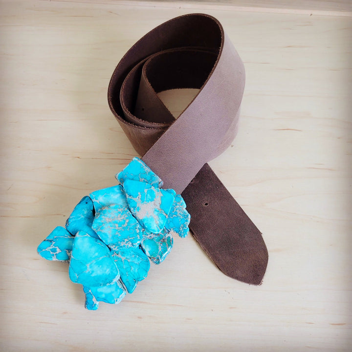 Distressed brown leather belt with turquoise stone cluster buckle accent