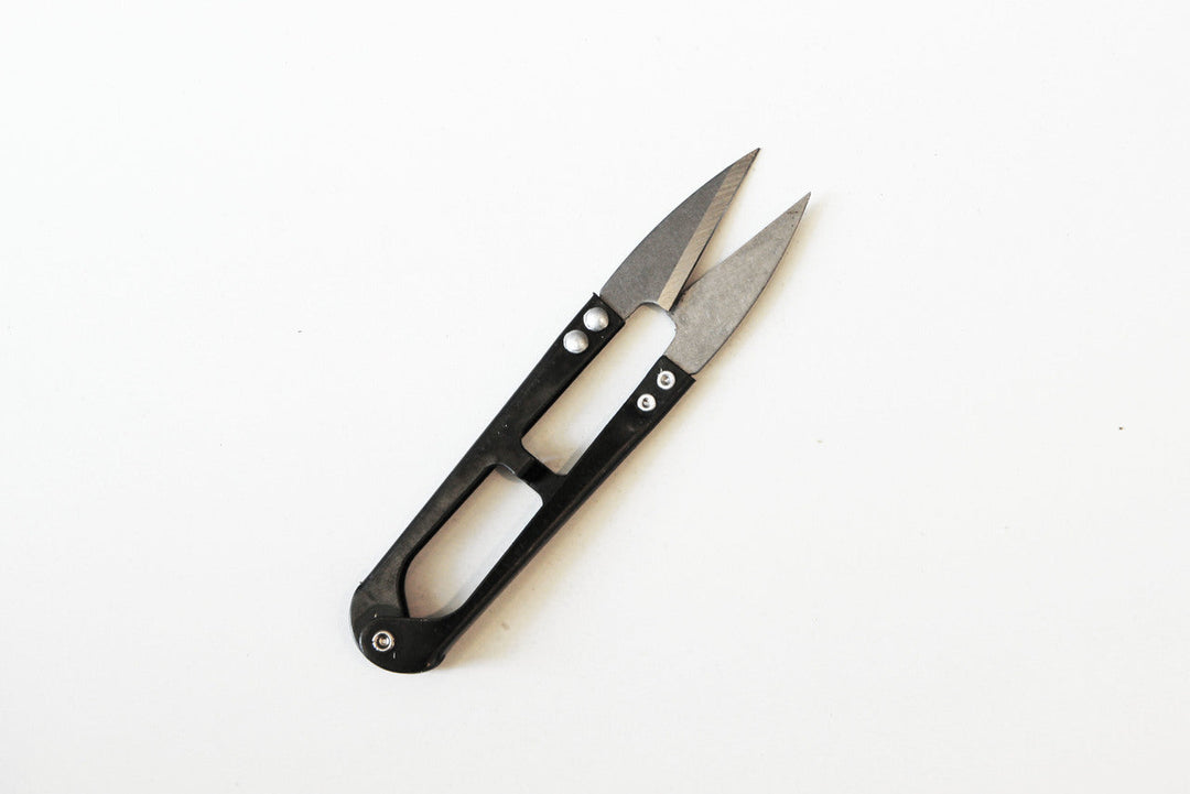 Herb snips with black handle and stainless steel cutting blades
