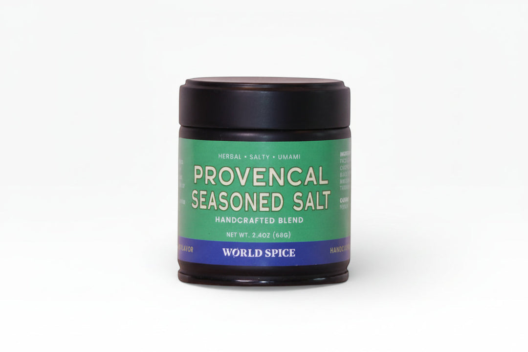 Seasoned salt jar with green label and blue band, black lid