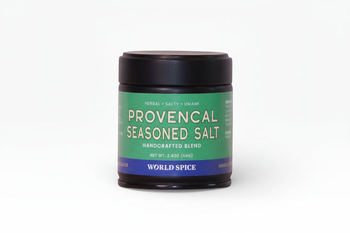 Seasoned salt jar with green label and blue band, black lid