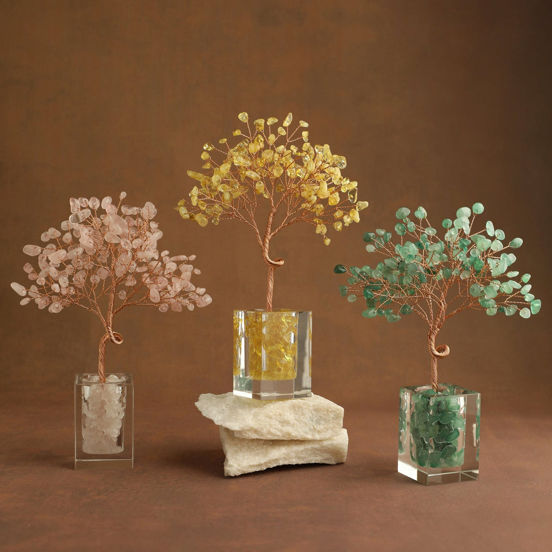 Set of crystal bead trees with yellow, pink, and green branches in cube stands