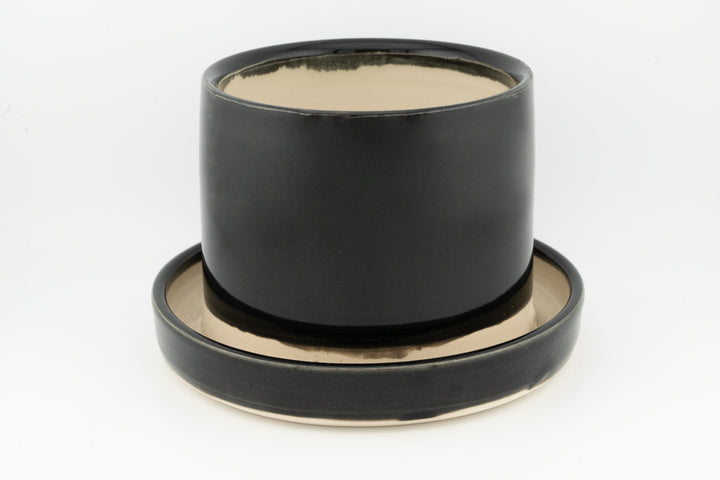 Tabletop planter set with drainage, glossy black glazed pot on matching tray.