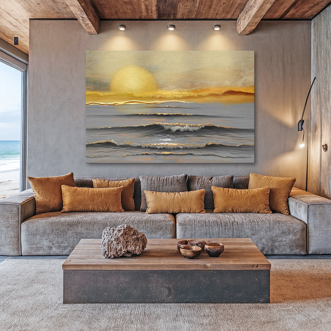 Sunset seascape wall art canvas above a sofa with orange and gray waves