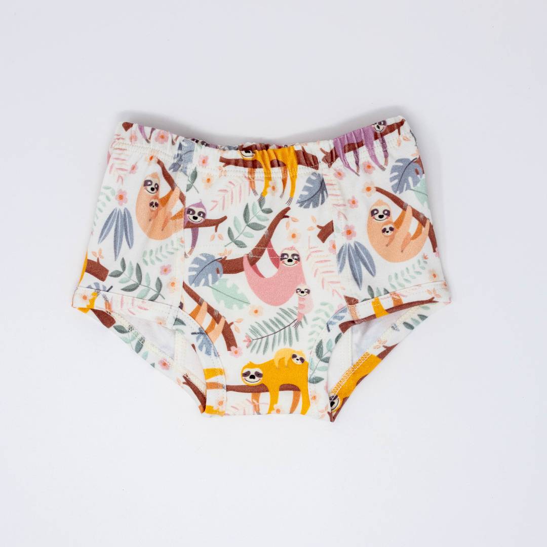 Cream training underpants with colorful sloth and jungle animal print, elastic waist