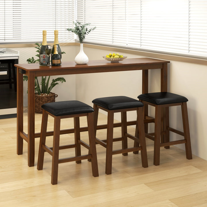 Counter-height bar table with three black padded stools, brown wood frame