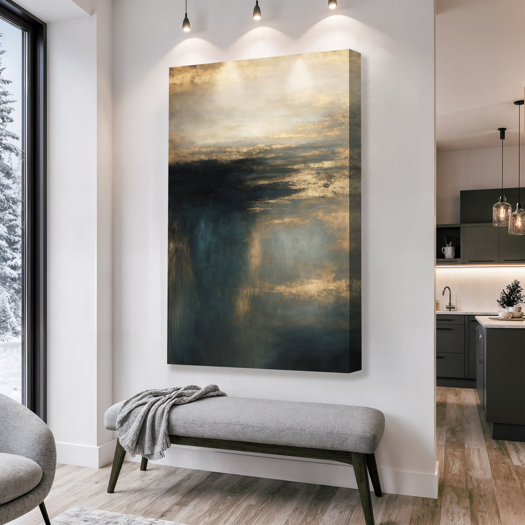 Vertical framed cloudscape wall art with gold clouds and teal shadows above bench.