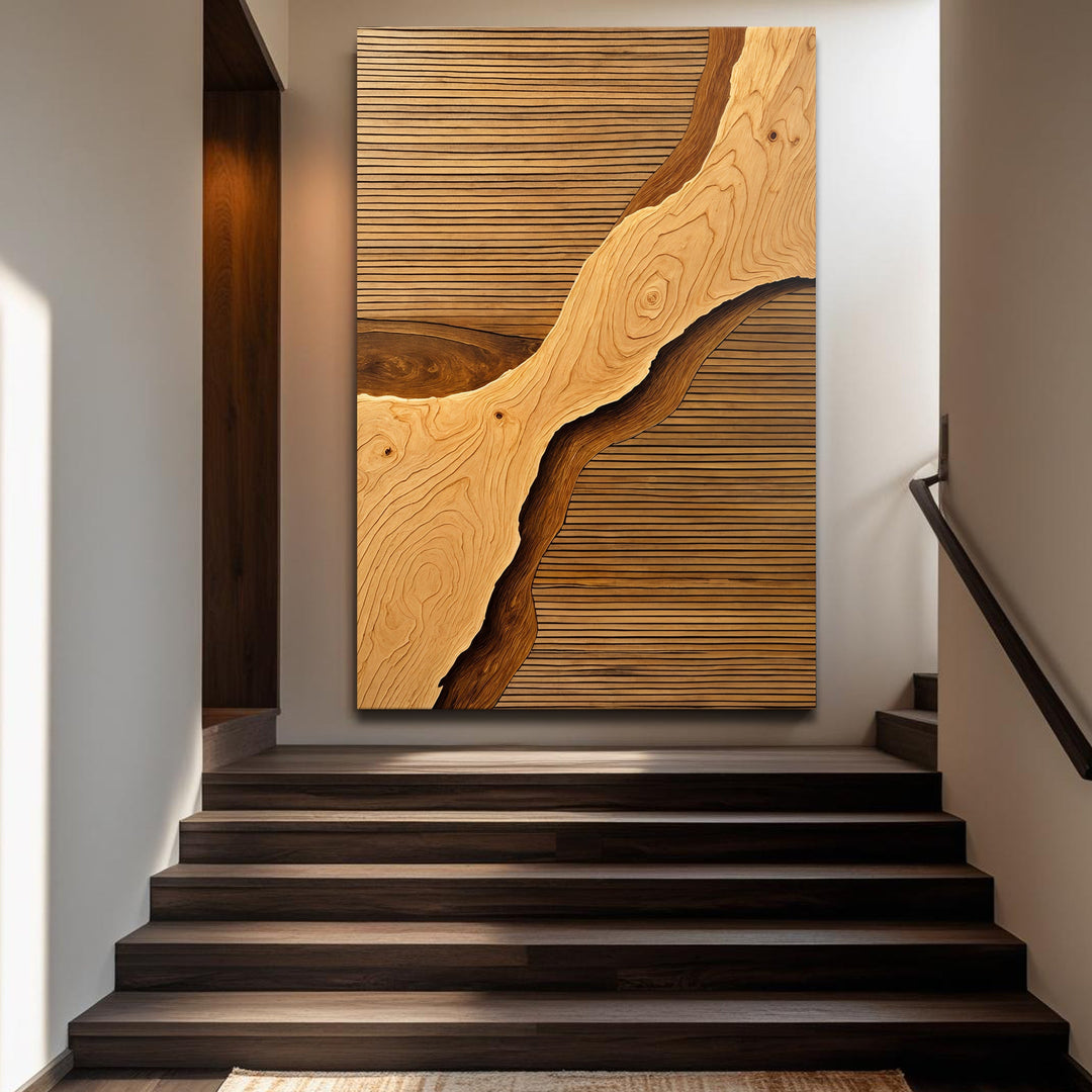 Wood rift wall art framed in stairwell, featuring swirling wood-grain centerpiece