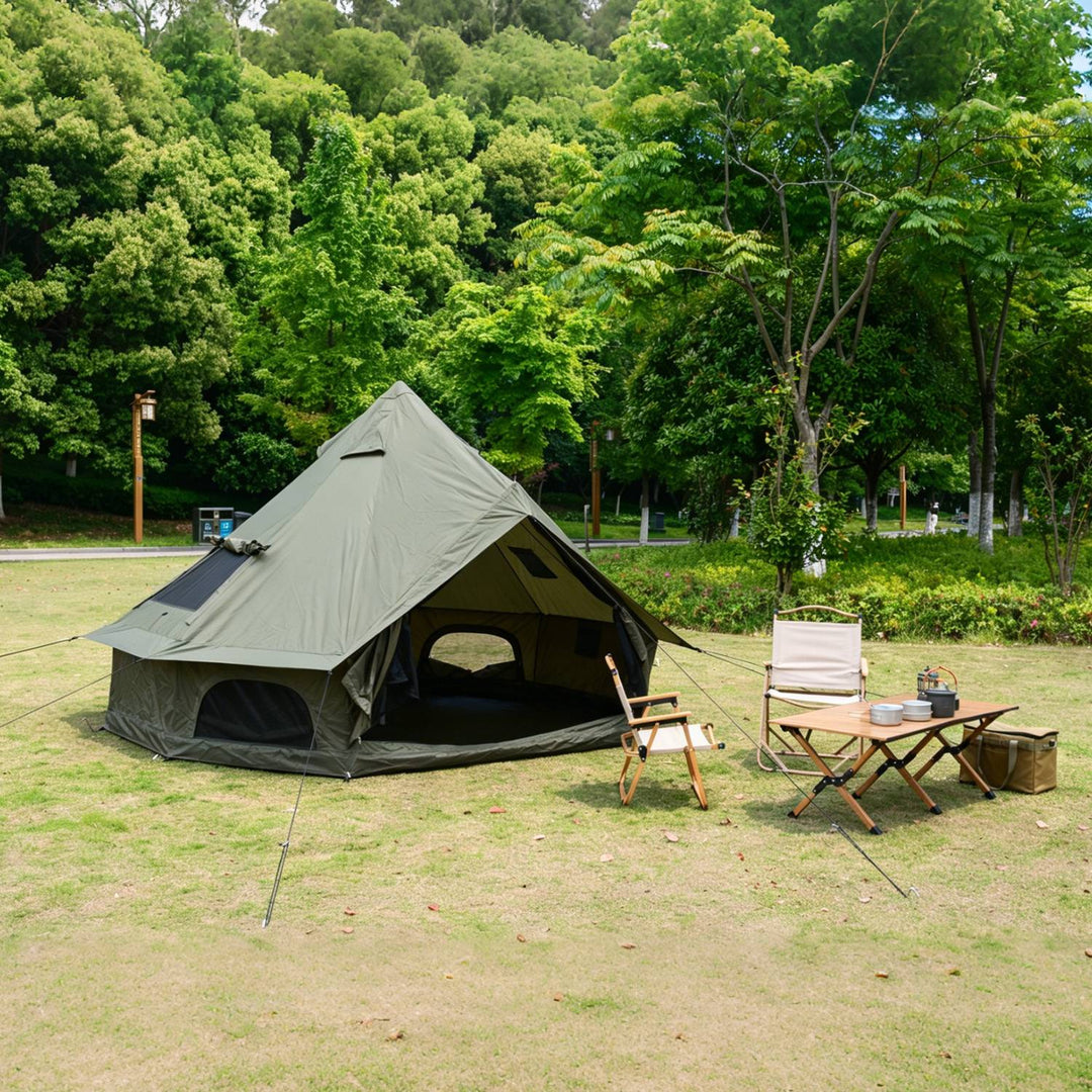 Oxford bell tent with light beige outer fly and dark front panel, outdoor camp setup.