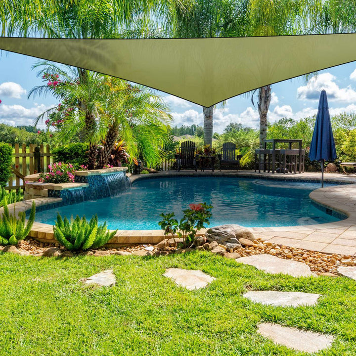 Olive triangular shade sail canopy shading a backyard outdoor area