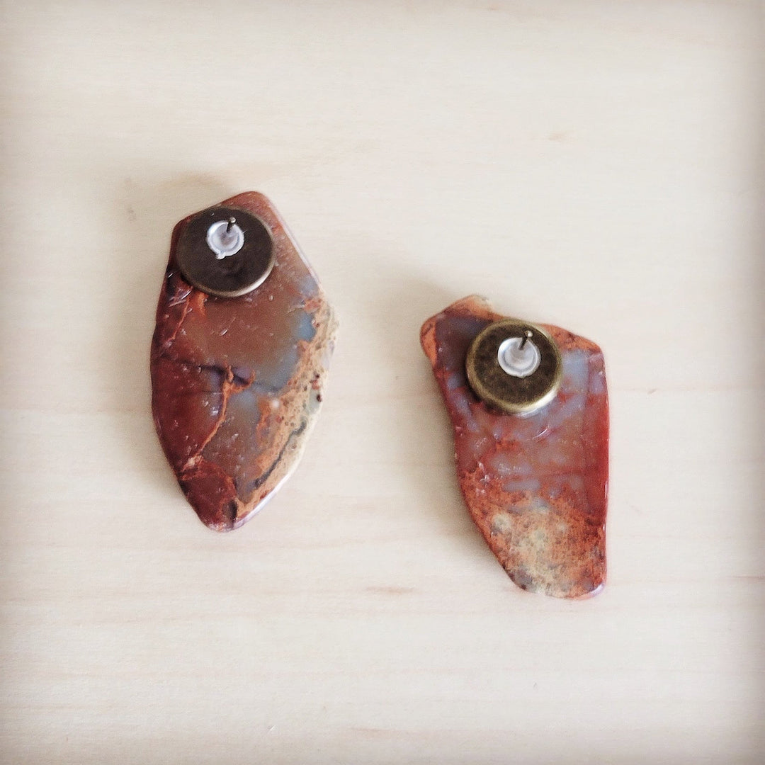 Red-brown slab stud earrings with circular gold-toned backing