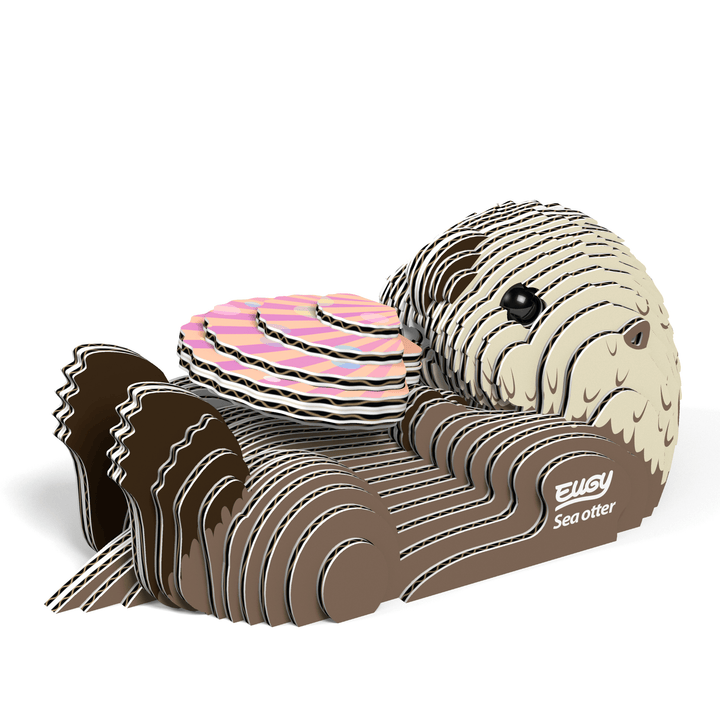3D sea otter puzzle model with layered pieces and striped base.