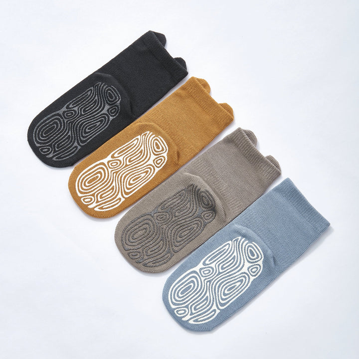 Non-slip crew socks with animal faces and textured soles, four pairs in mixed colors