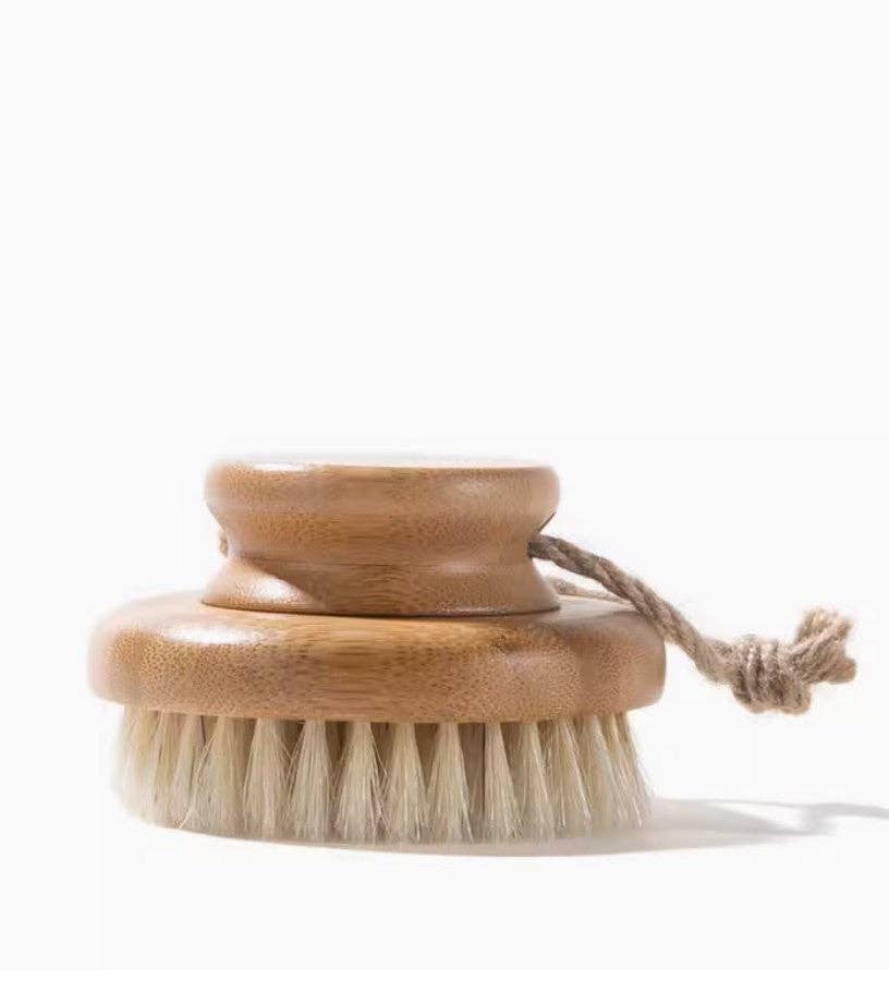 Round body brush with two-tier bristle head and light wood handle