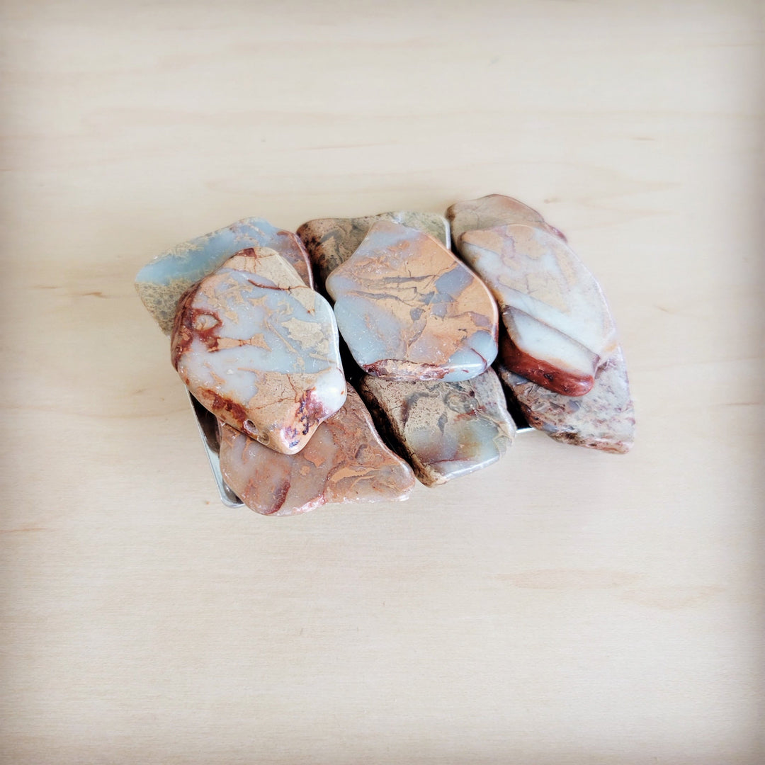 Stone slab belt buckle pieces, marbled aqua, tan, and rust stones