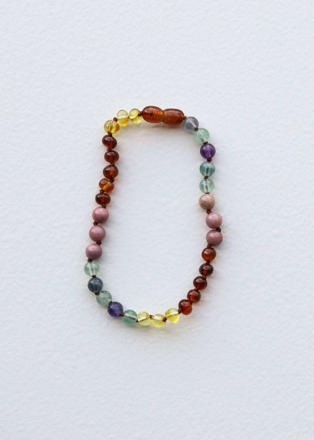 Multicolored stone bead amber necklace, single strand with round beads.