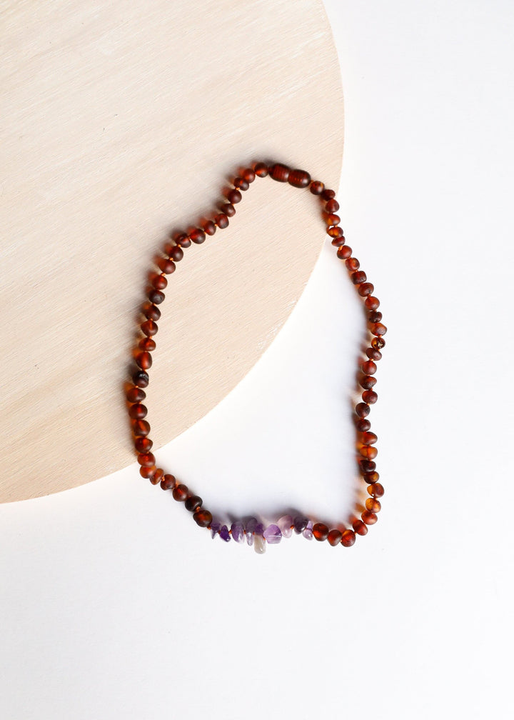 Raw amber and amethyst beaded necklace with small purple amethyst tips