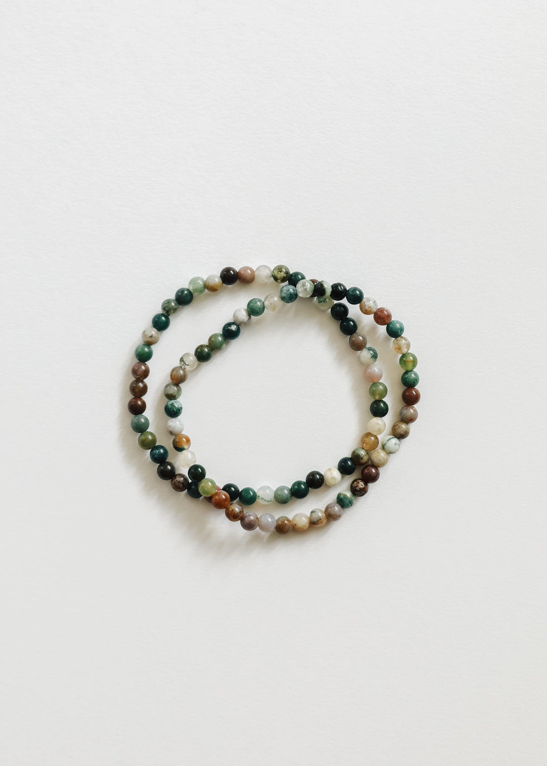 Polished agate bead bracelet with layered look, dark green, black, and warm brown beads