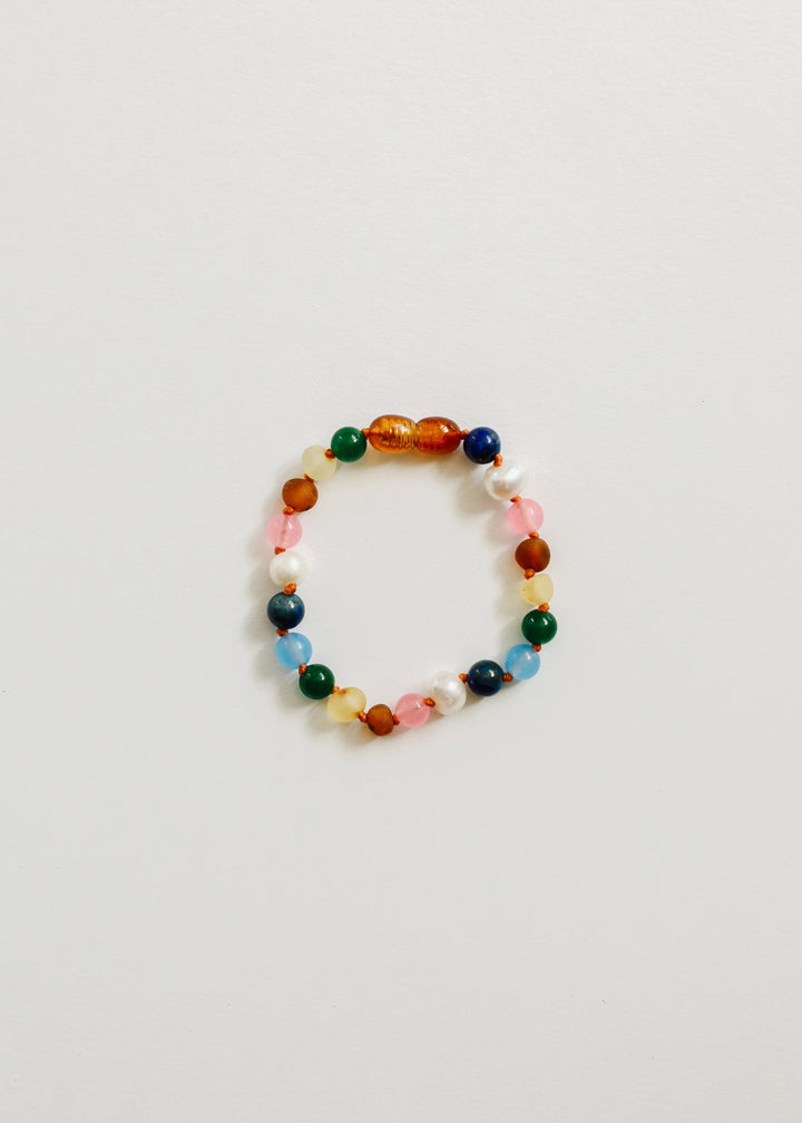 Beaded bracelet with multicolor round beads, white pearls, and pink gemstone beads