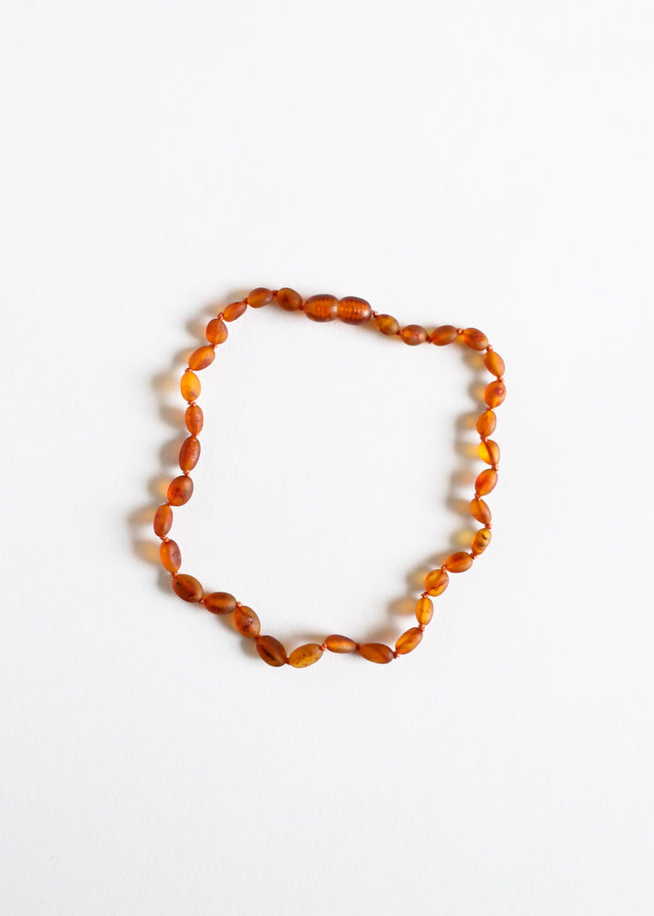 Cognac amber bead necklace, classic strand with faceted oval beads