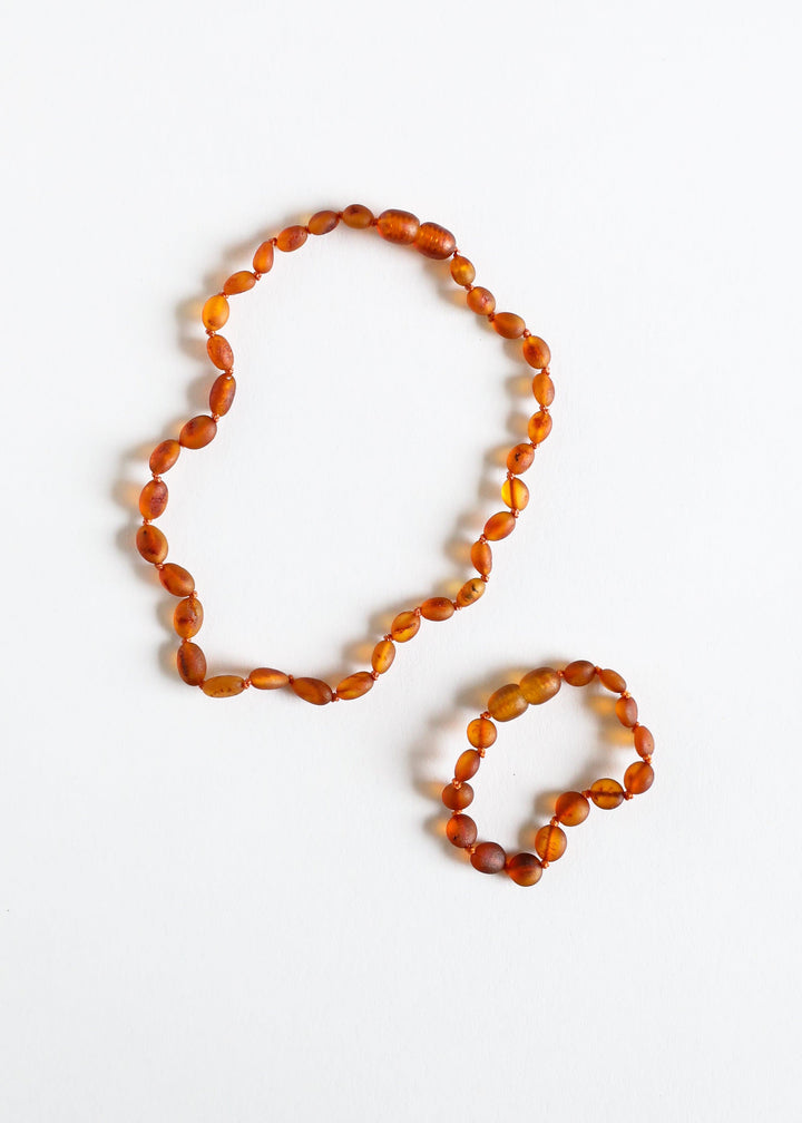 Cognac amber bead necklace set, long strand and shorter strand with faceted beads