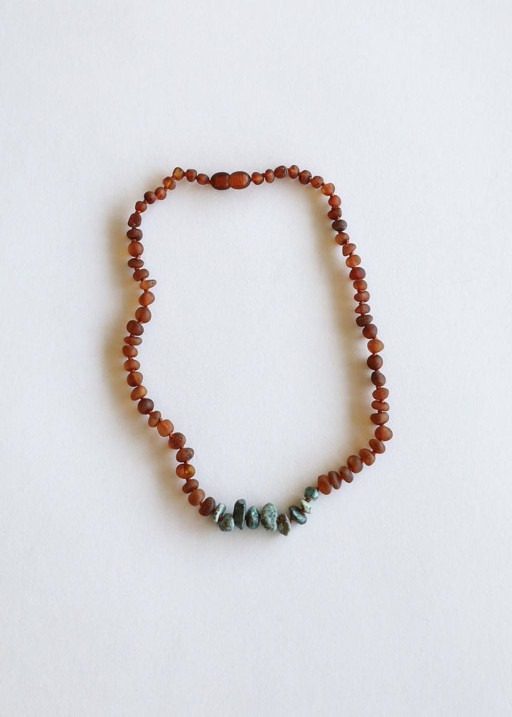 Raw cognac amber bead necklace with raw turquoise jasper stone drop