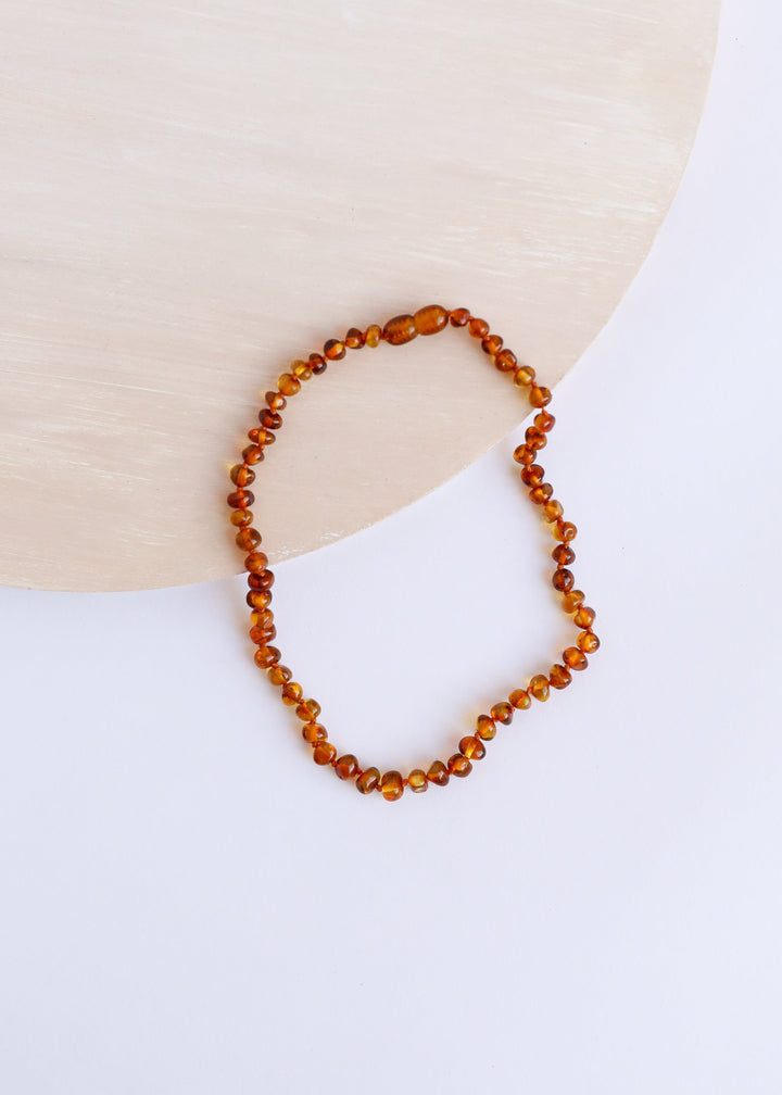 Cognac amber beaded necklace, looped with small round beads