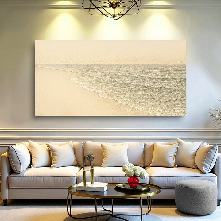 Framed beach shoreline canvas print with sandy coast and shimmering ocean texture.