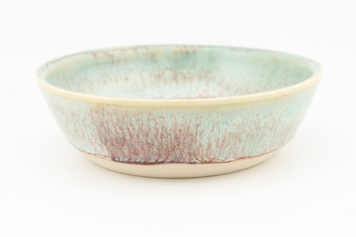 Turquoise glazed ceramic cat dish with speckled finish