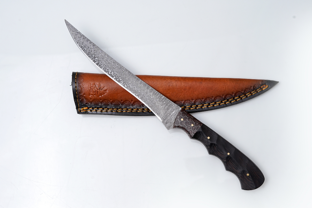 Damascus steel fillet knife with dark wood handle and brown leather sheath