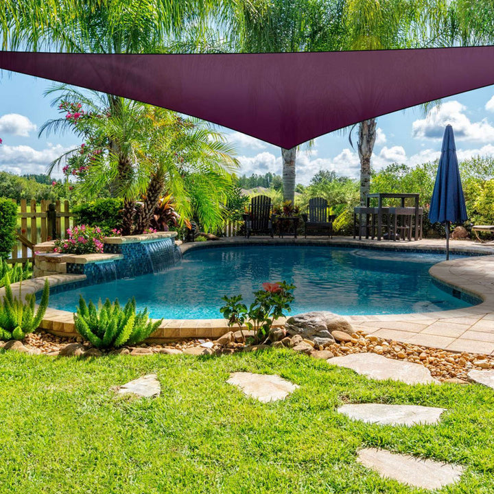 Purple triangle shade sail canopy stretched outdoors