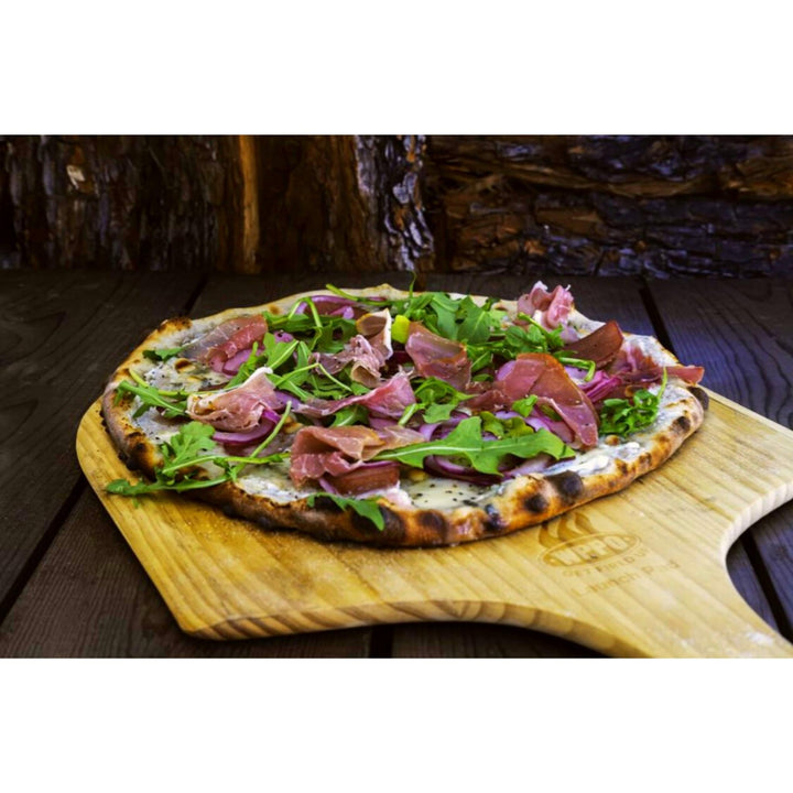 Wooden pizza peel holding a topped pizza, arched paddle and wide transfer surface