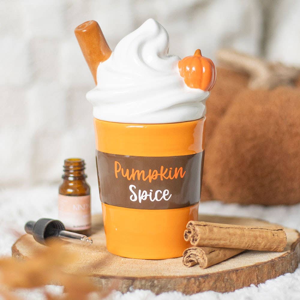 Lidded pumpkin spice wax warmer with ceramic orange and brown cup, white lid topper