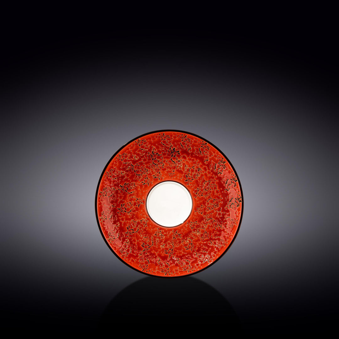 Red porcelain saucer with textured red glaze and round white center