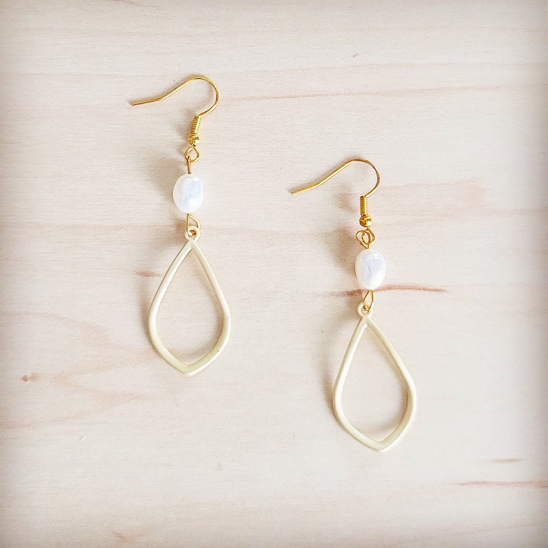 Gold drop earrings with teardrop frame and white freshwater pearl dangle
