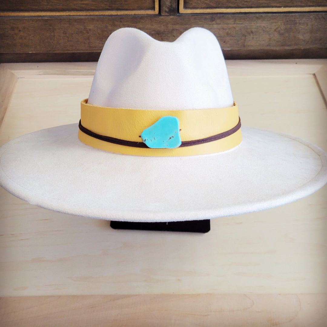 Wide-brim white felt hat with mustard leather band and turquoise center accent