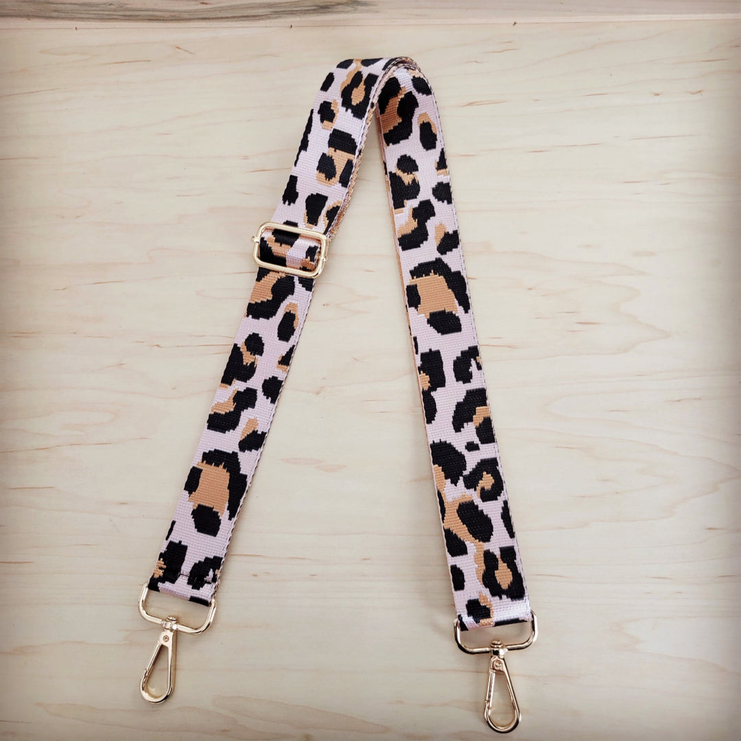 Leopard-print crossbody strap with two adjustable buckles and gold-tone clips