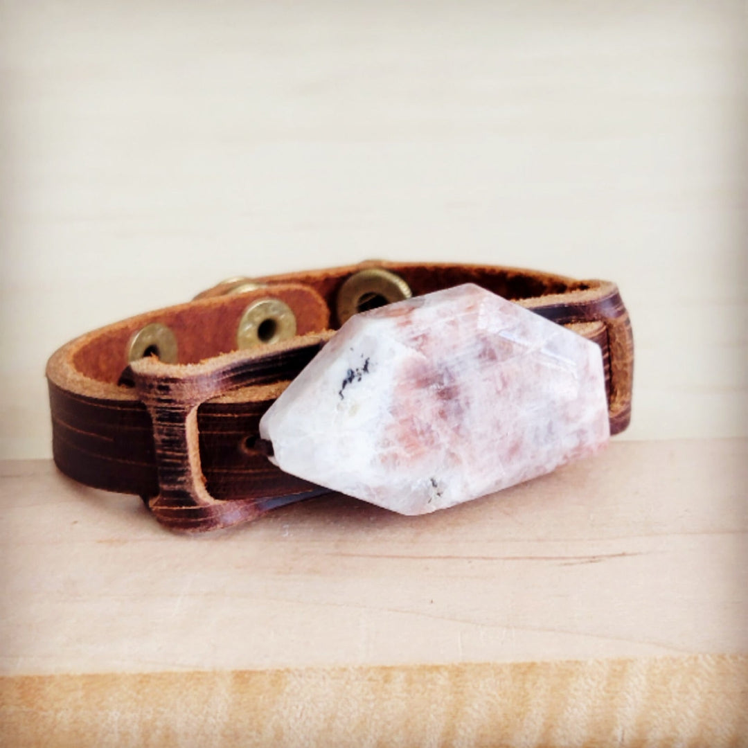 Brown narrow leather cuff bracelet with pink-white crystal stone detail and rivets
