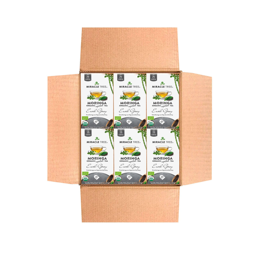Bulk tea carton pack with organic moringa Earl Grey labels in open cardboard box