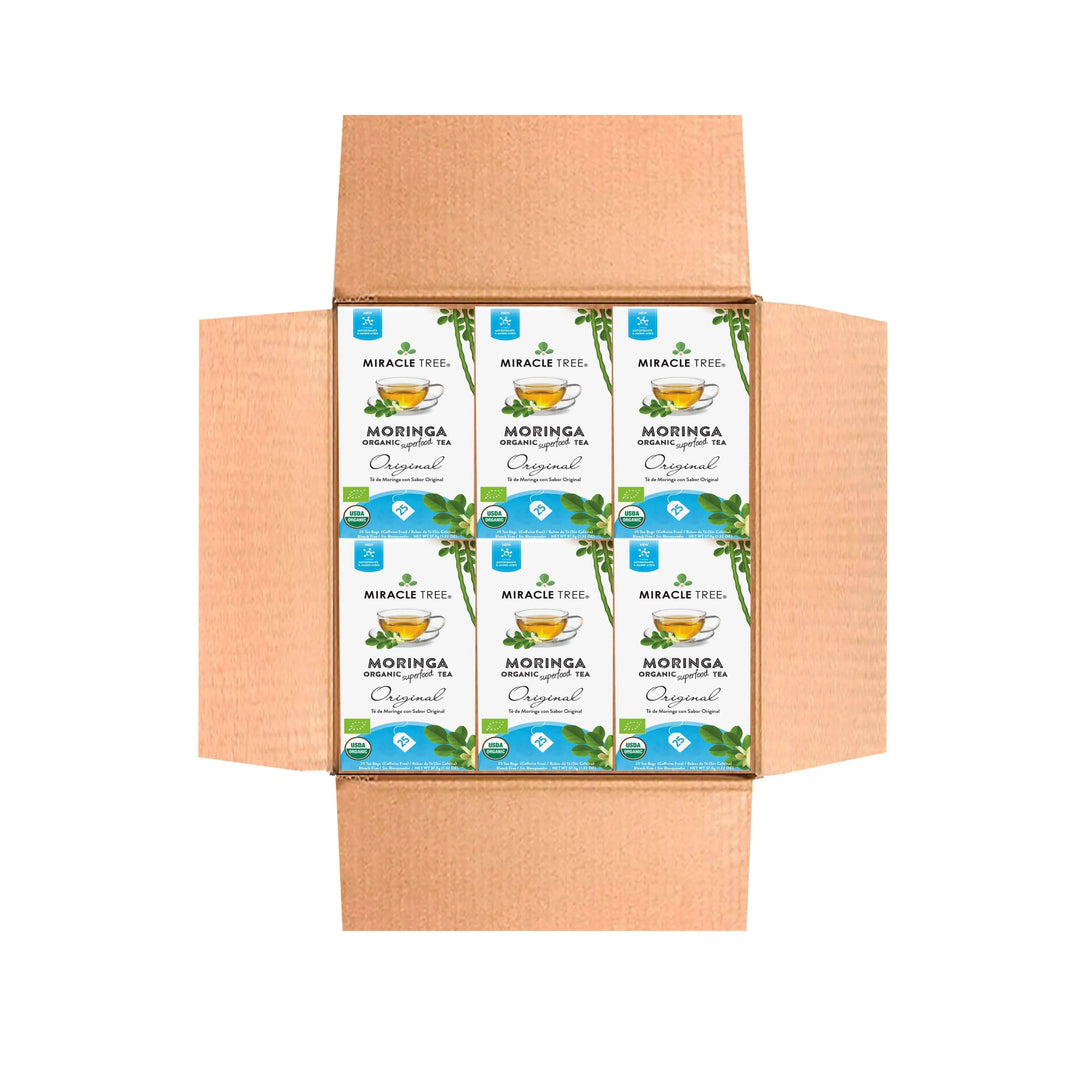 Kraft shipping box with Miracle Tree Moringa Original tea packets on top