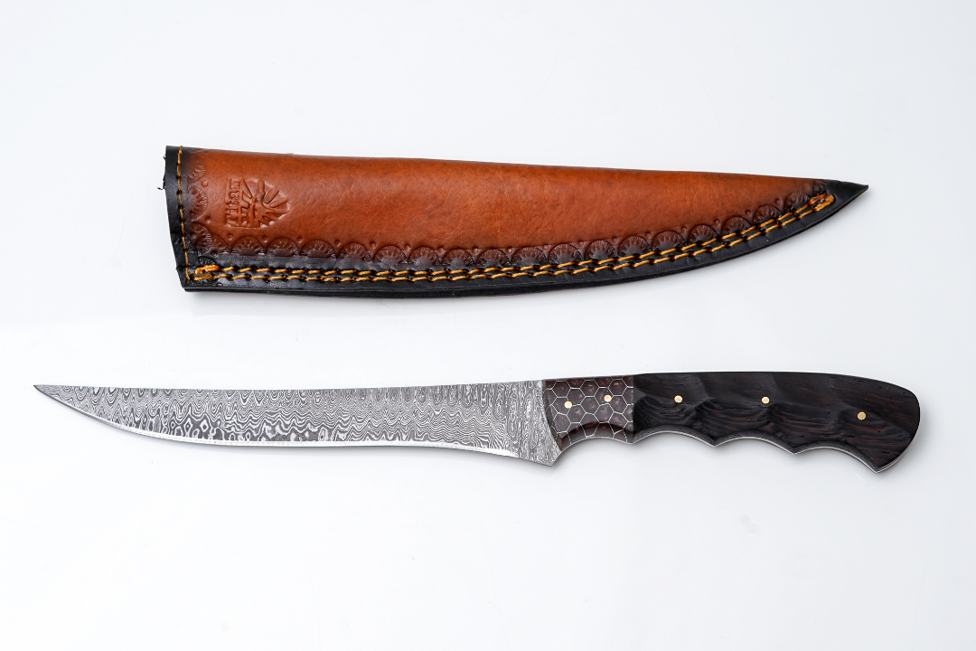 Damascus fillet knife with honeycomb guard and dark wood handle, plus brown sheath