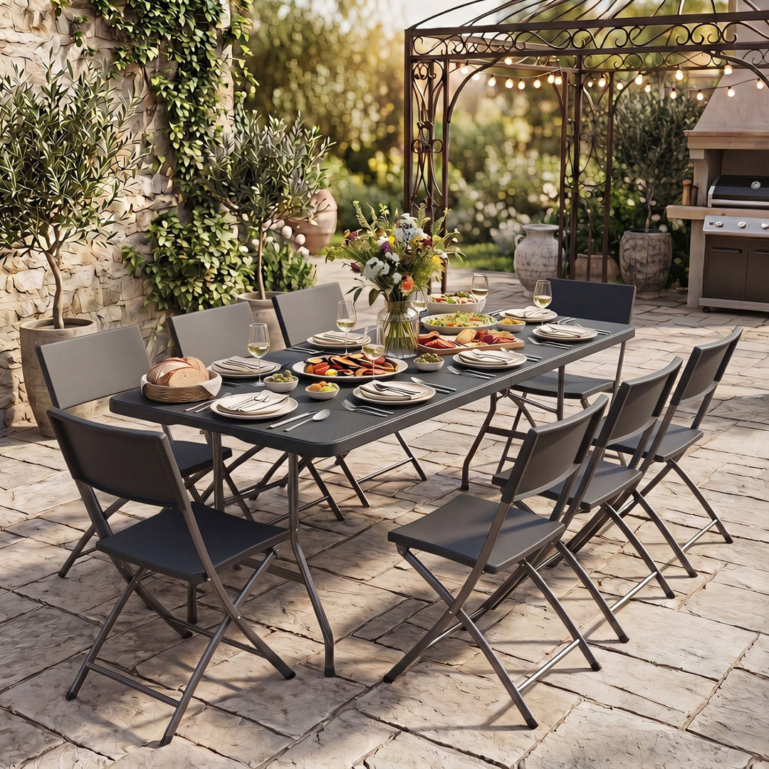 Outdoor fold-in-half camping table with dark rattan-textured top and metal folding legs