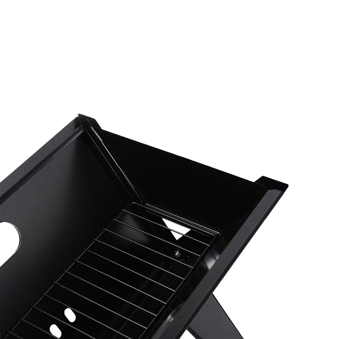 Black foldable charcoal grill with wire cooking grate and open side frame