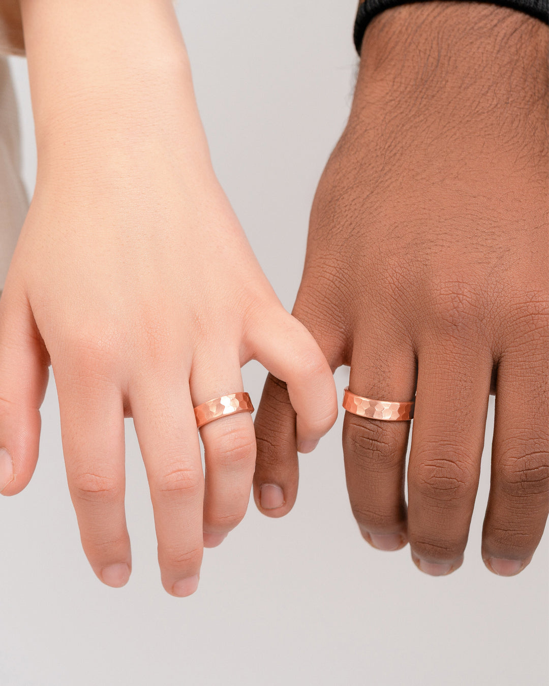 Hammered copper band rings, 6mm, worn on two hands