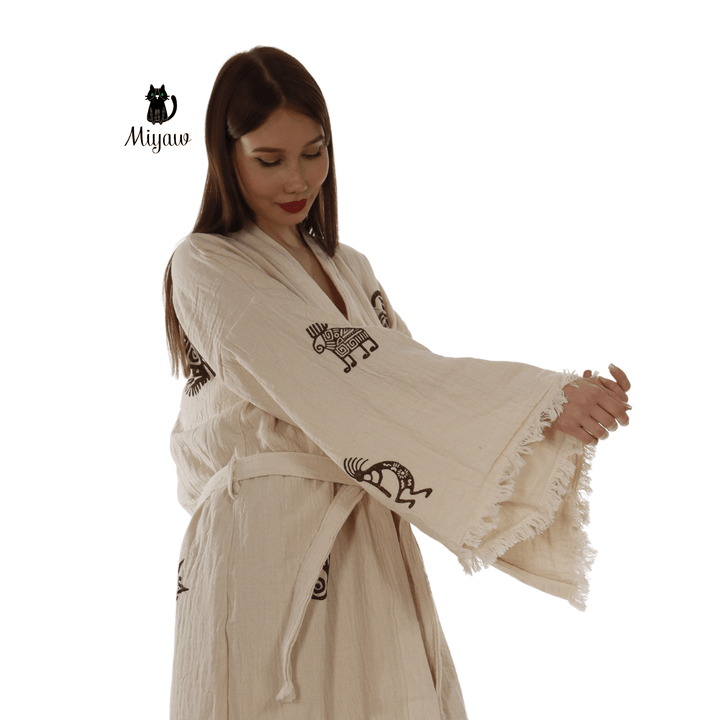 Beige cotton kimono bathrobe sleeve with Aztec motif print and fringe edge
