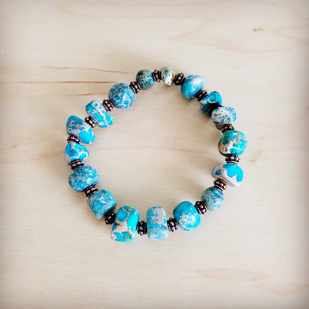 Turquoise and copper stretch beaded bracelet with oval and round bead mix